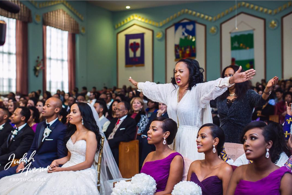 Black Wedding Moment Of The Day: This Mom Praying With Outstretched Arms Over Bride And Groom Is Taking Us To Church
